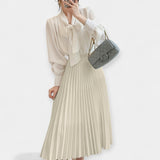 Dlouhá plisovaná saténová sukně