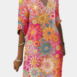 Barevné Letní Šaty S Květinovým Vzorem A Pohodlným Střihem