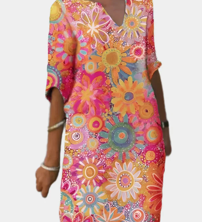 Barevné Letní Šaty S Květinovým Vzorem A Pohodlným Střihem
